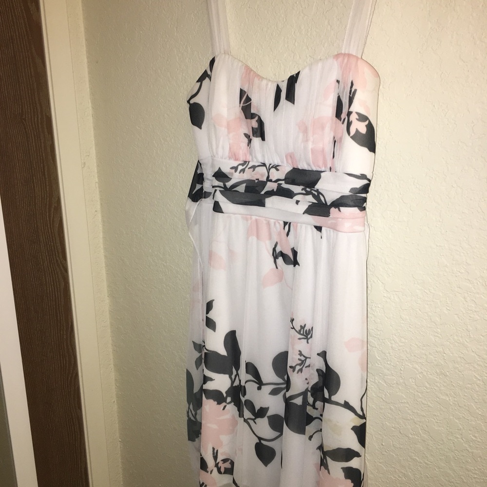 White flowy dress with grey and light pink flowers